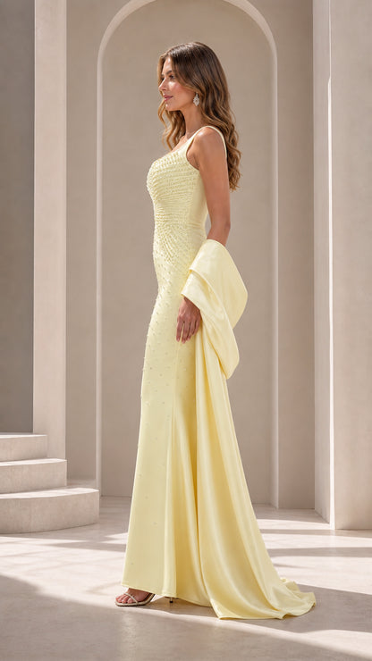Side profile view of Butter Yellow fitted mermaid formal dress