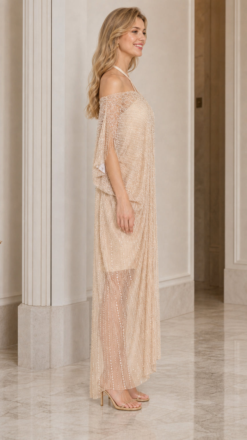 Champagne embellished evening gown side view showing relaxed drape and mini slip lining