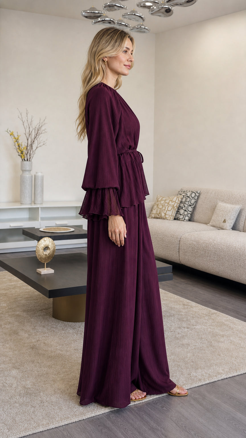 Side profile view of woman wearing Plum flowy long sleeve two piece set