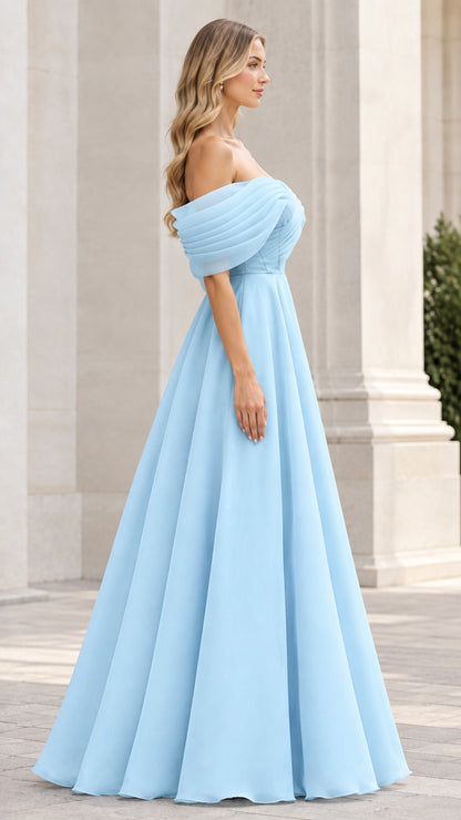 Side profile of model in a light blue sweetheart off-shoulder formal maxi dress