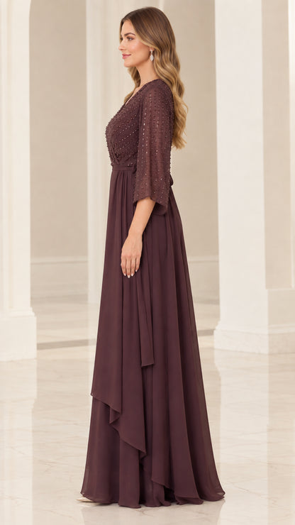 Side profile view of woman wearing Plum beaded formal gown