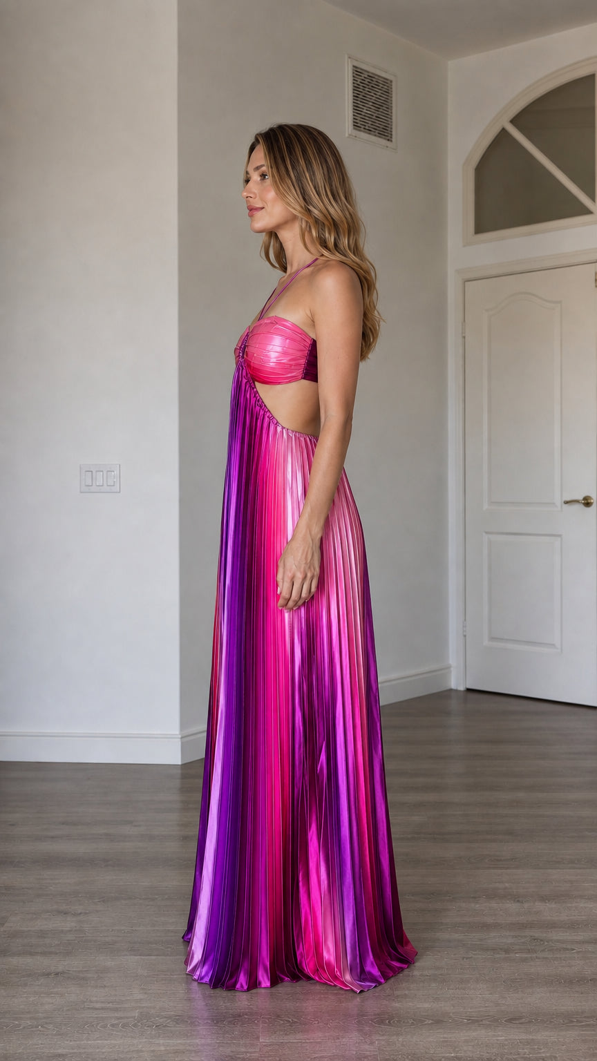 Side profile view of model wearing the multi pink metallic pleated maxi dress