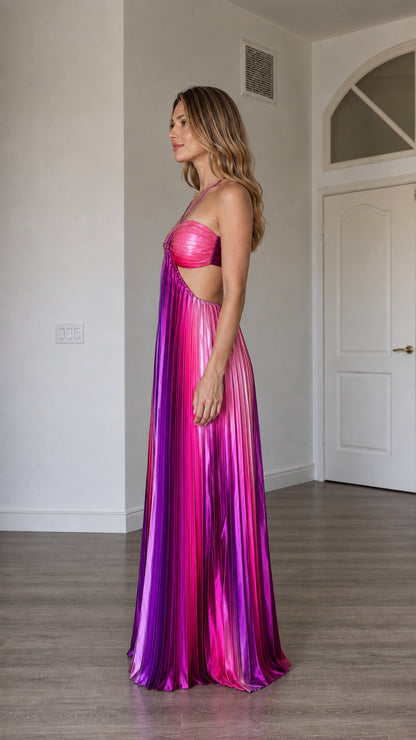 Side profile view of model wearing the multi pink metallic pleated maxi dress
