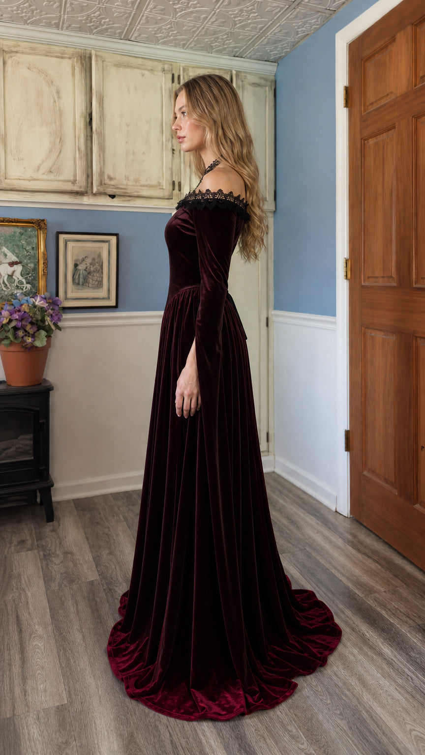 Model wearing Burgundy velvet dress from side profile