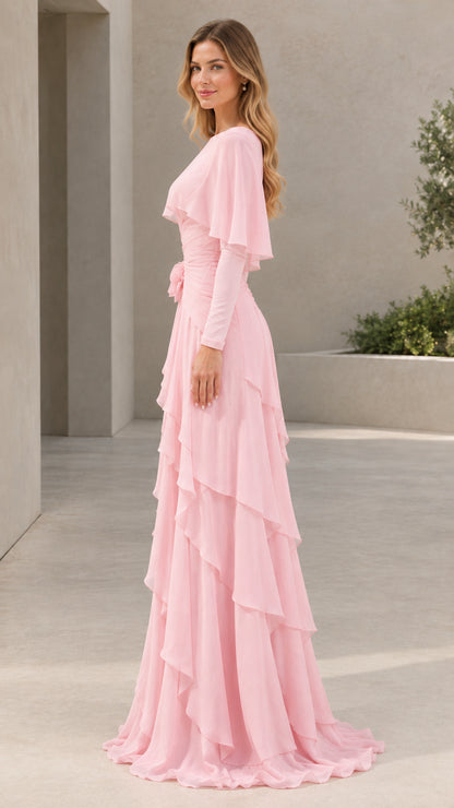 Side profile of woman in Light Pink floor-length capelet evening gown
