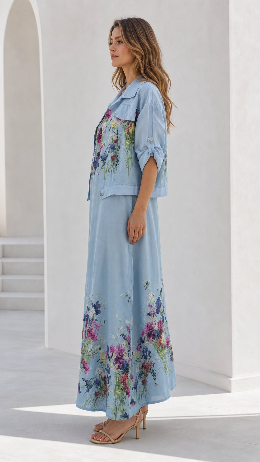 Side profile of sky blue floral two-piece maxi dress set