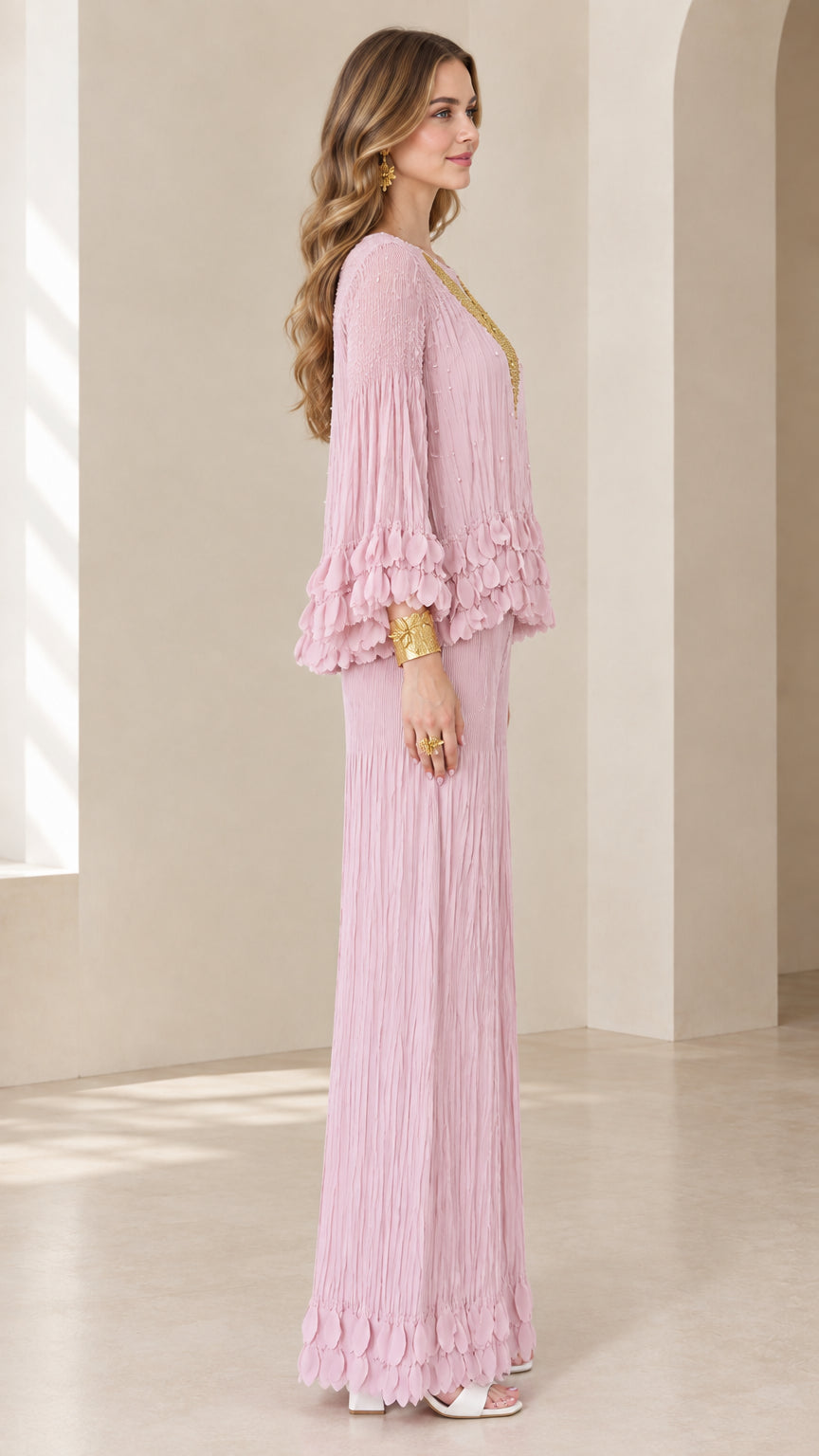 Side profile view of pink crinkle matching set with tiered ruffle hem