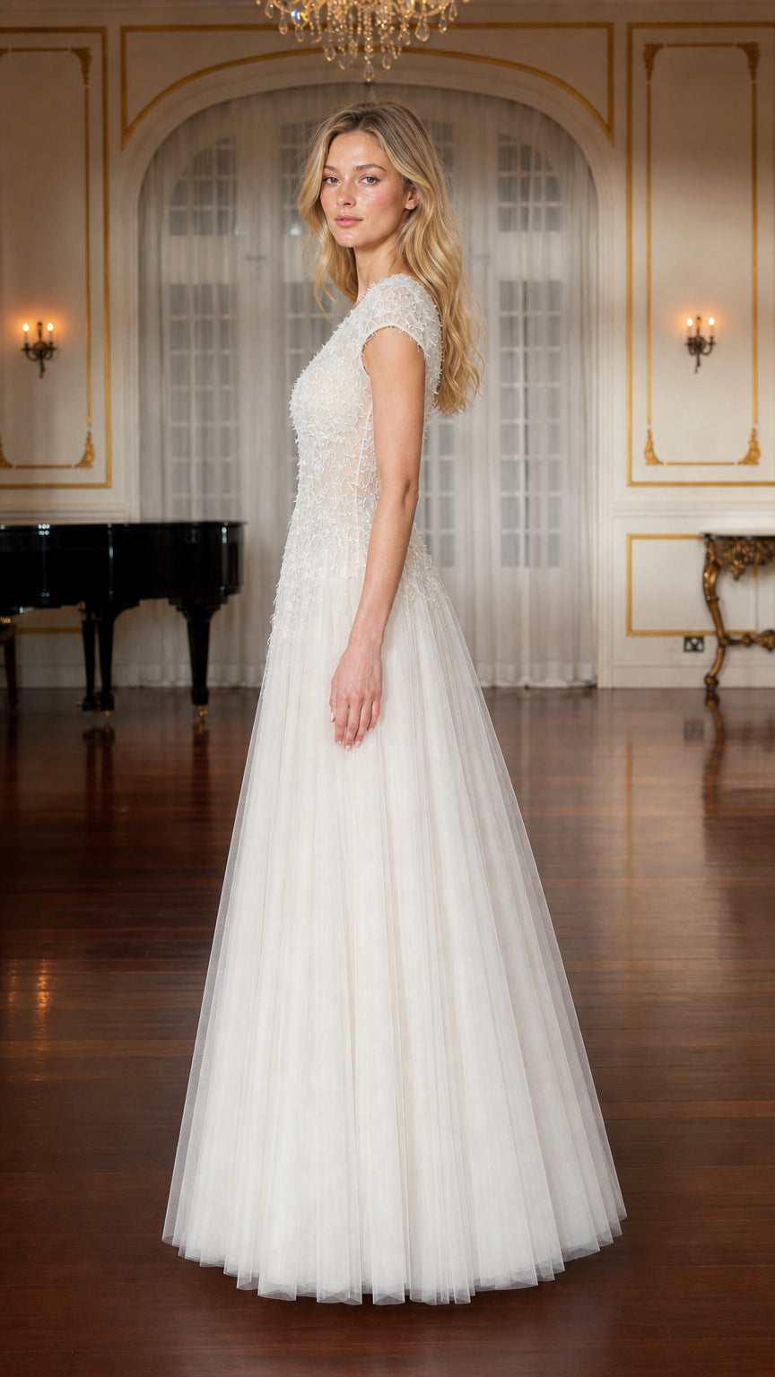 Side profile of ivory formal gown