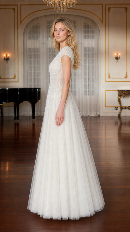 Side profile of ivory formal gown