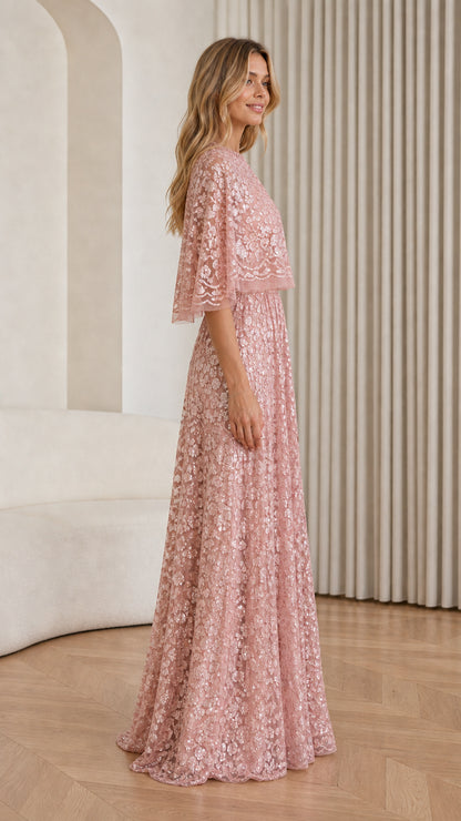 Side profile view of Dusty Rose sequin cape maxi dress