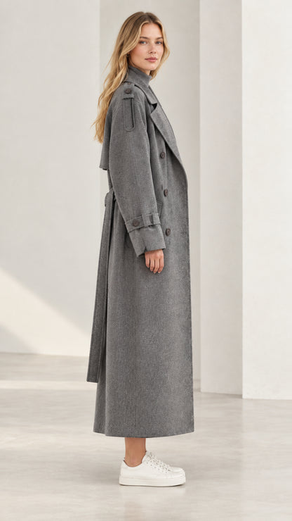 Side profile view of grey longline textured trench coat