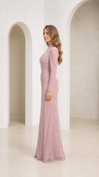 Side profile of model in dusty rose lace maxi dress