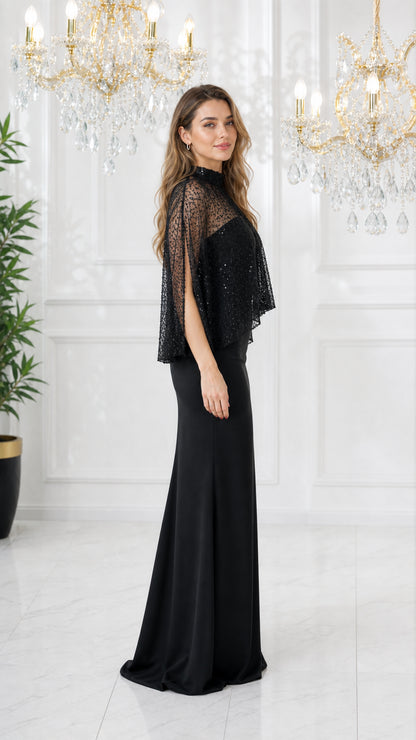 Side angle view of model wearing black sequin cape formal maxi dress