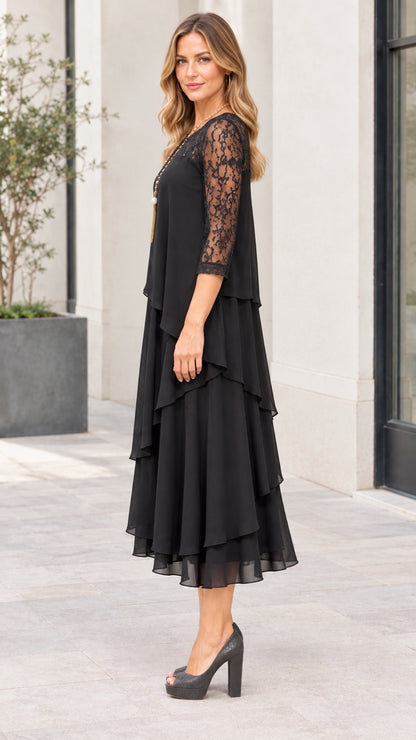 Side profile of black 3/4 sleeve asymmetrical tiered chiffon midi dress