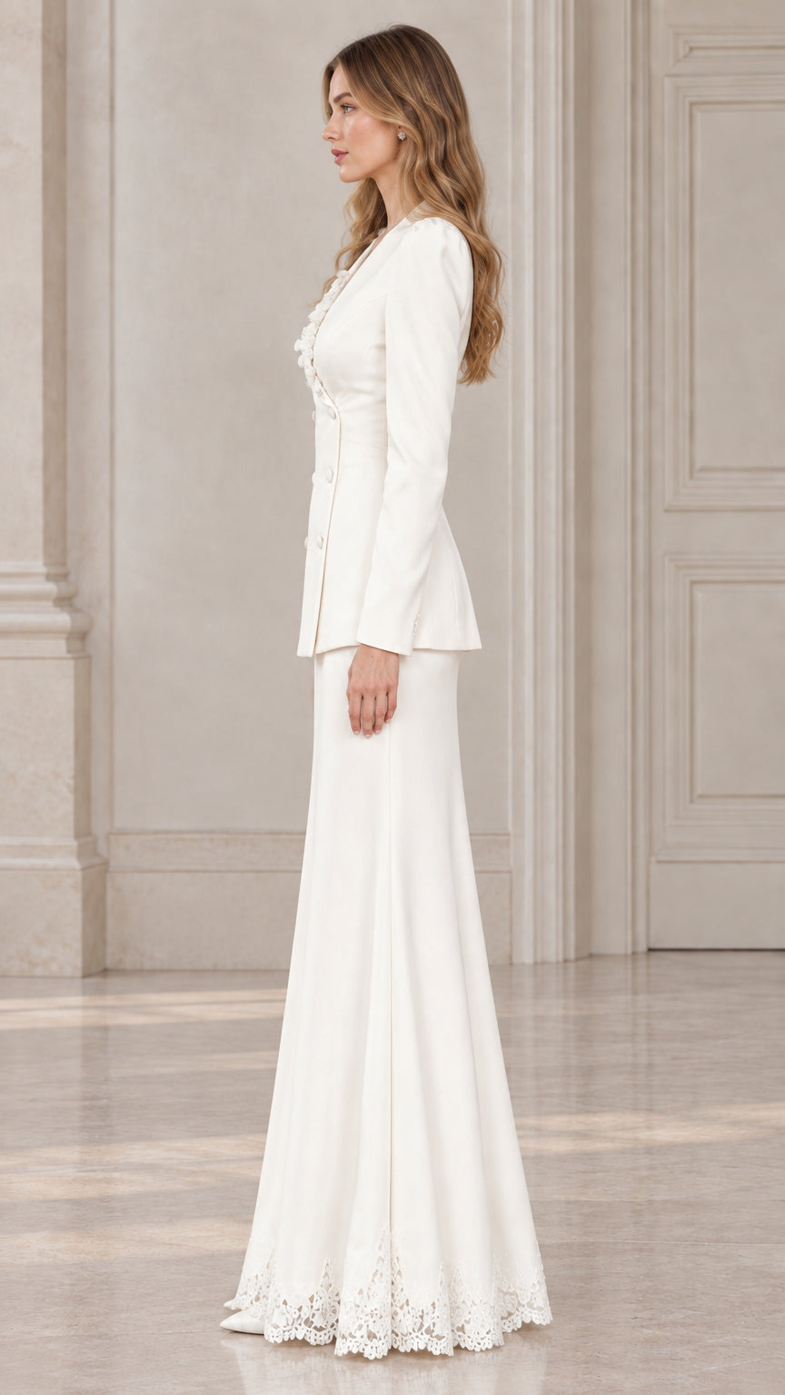 Side view of model showing tailored silhouette of ivory formal two piece skirt suit