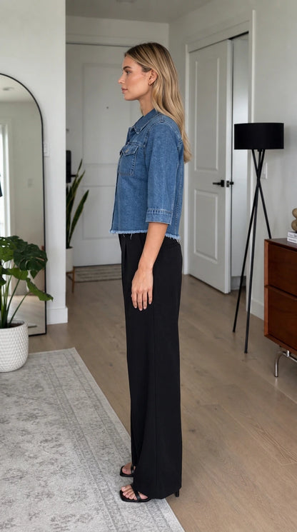 Side profile view of blue denim shirt jacket and trousers
