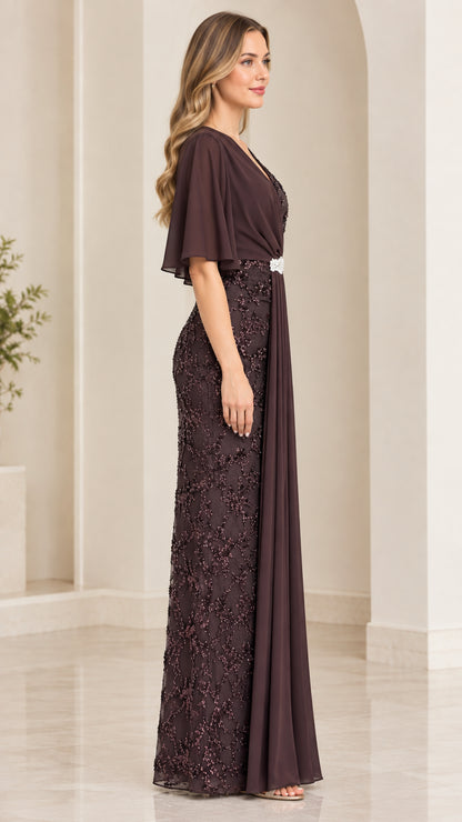 Side profile view of dark plum formal gown showing draped chiffon silhouette