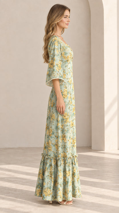 Side profile of Sage Green floral maxi dress showing fluid drape