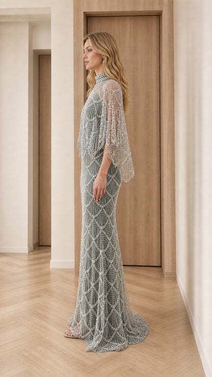 Side profile view of sage green beaded floor-length formal dress