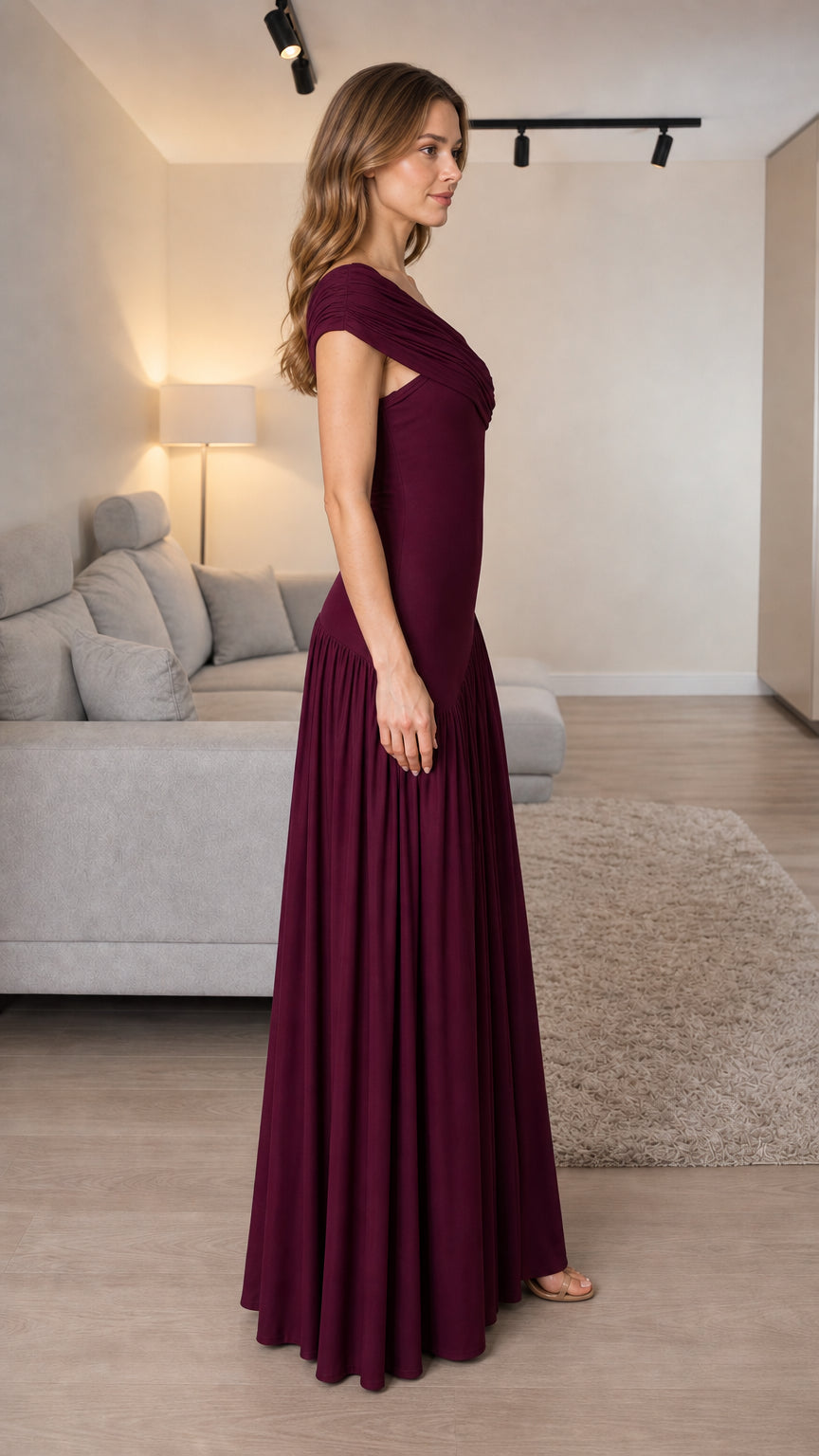 Side profile of burgundy one-shoulder formal evening gown