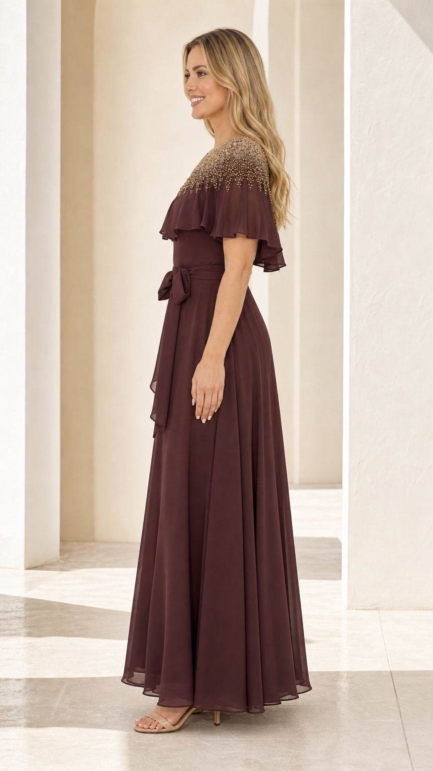 Side profile view of burgundy evening maxi dress