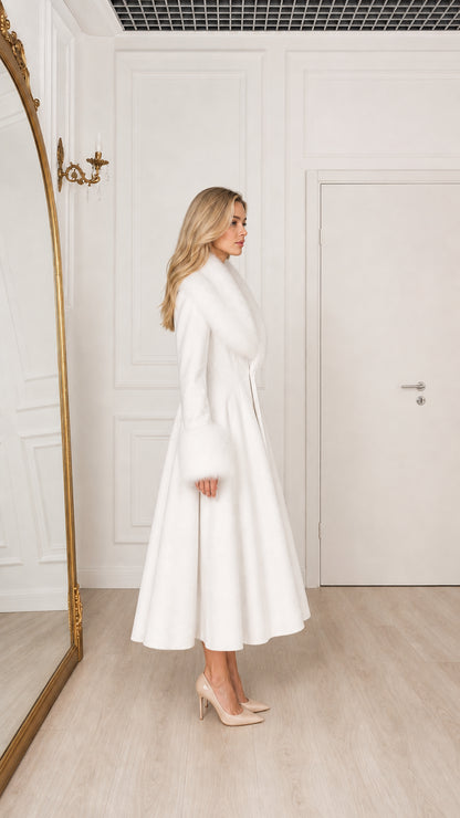 Model in white princess swing coat with fur trim side angle view