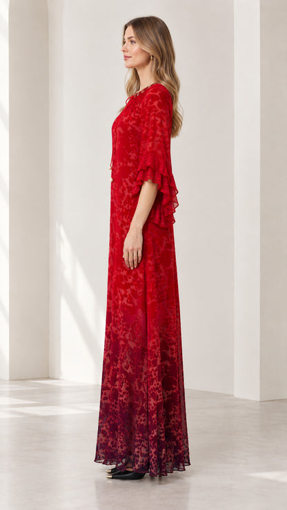 Side profile of model in Ruby Red floor-length dress showing elegant drape