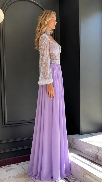 Model wearing lavender beaded evening maxi romper dress side view