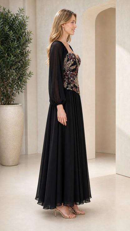 Side view of black formal maxi dress with floral beaded corset bodice