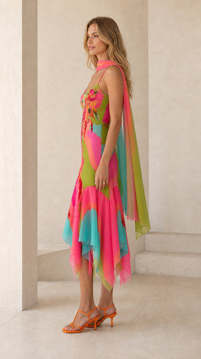 Side profile of vibrant multi pink watercolor midi dress