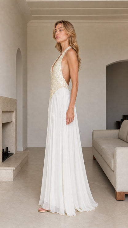 Side profile view of White Sequin Halter Pleated Maxi Dress