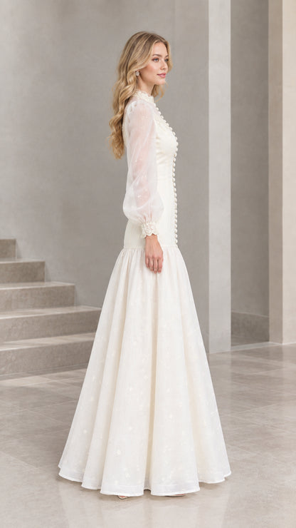 Side profile of Ivory vintage puff sleeve A-line maxi gown