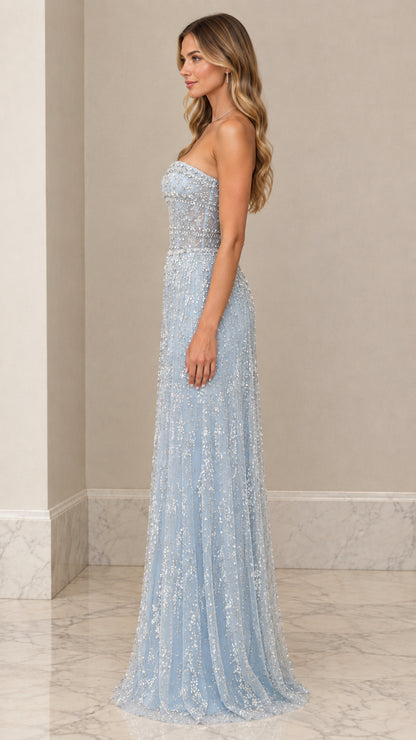 Side profile of model wearing Light Blue strapless beaded maxi formal dress
