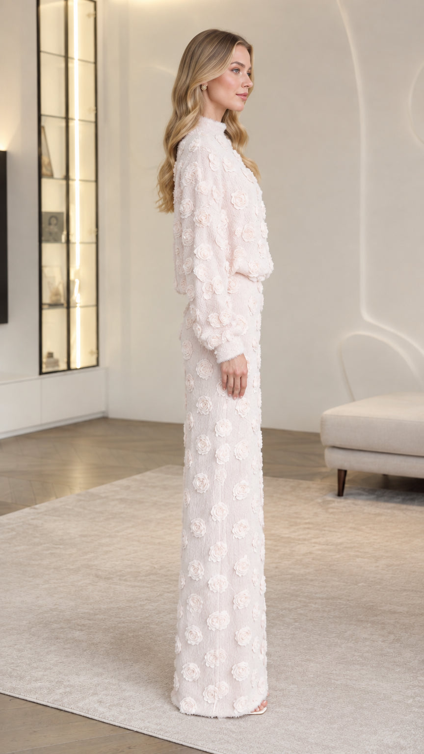 Side profile view of woman modeling Blush Pink 3D floral textured co-ord set