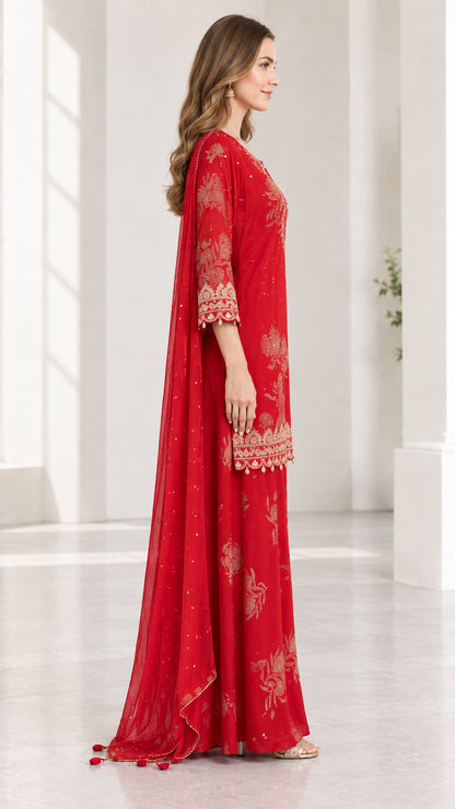 Side profile of woman wearing red 3-piece ethnic sharara suit set