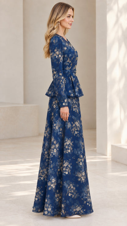 Side profile view of model wearing Navy Blue long sleeve floral maxi dress