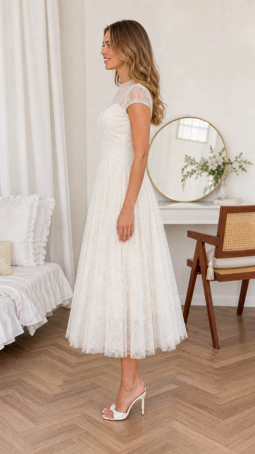 Side profile view of woman wearing Ivory White cap sleeve lace midi dress