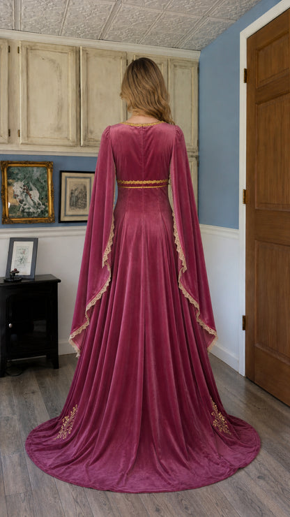 Back view of burgundy velvet costume dress with lace-up back