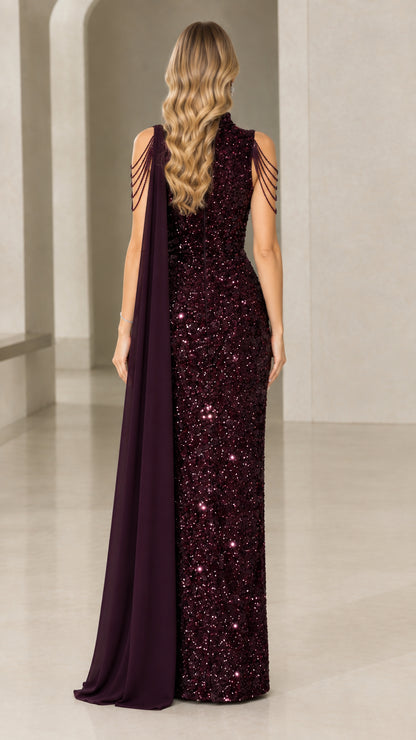 Back view of burgundy sequin cape dress with high zip closure