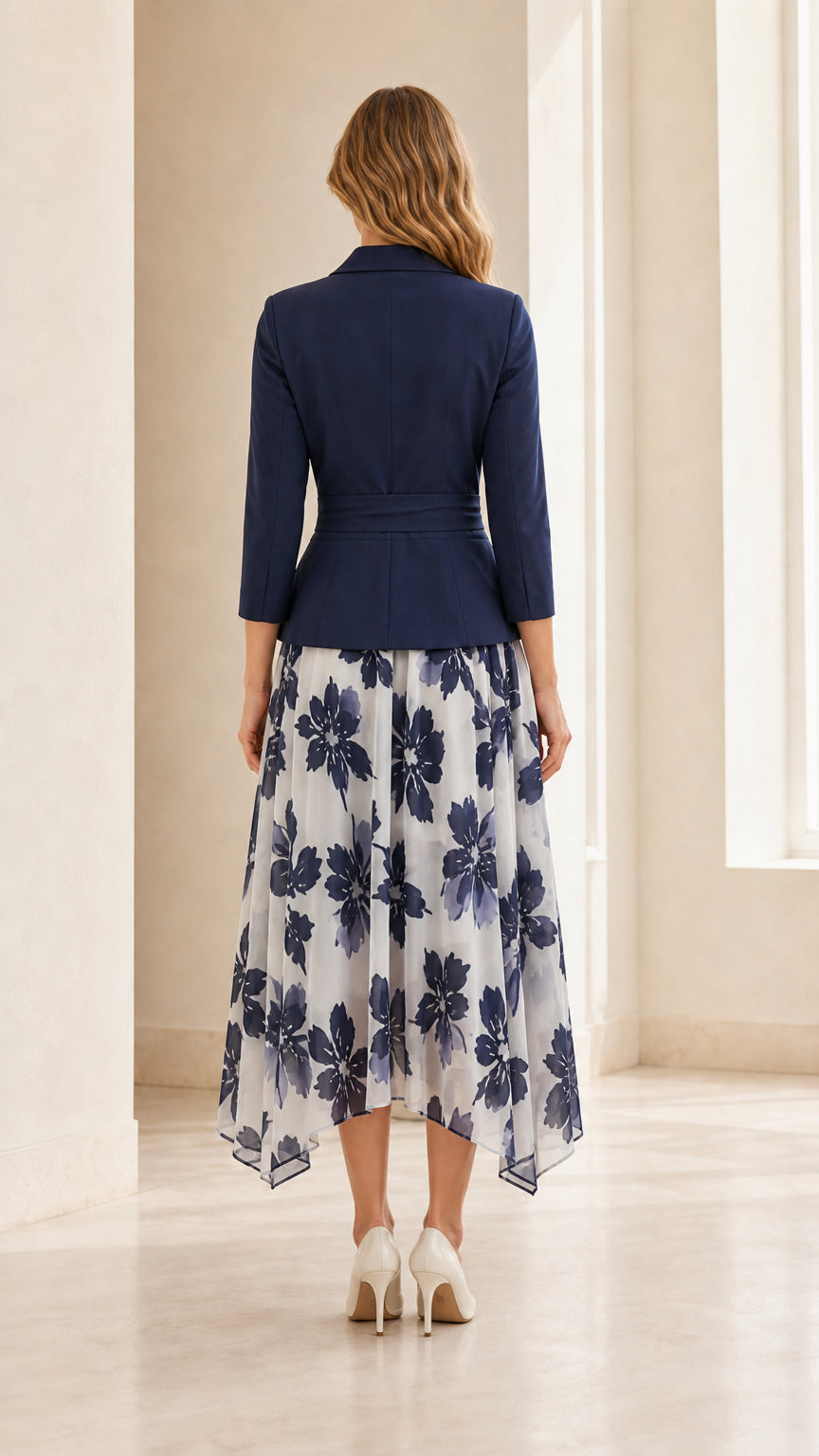 Back view of woman wearing navy blazer floral midi dress