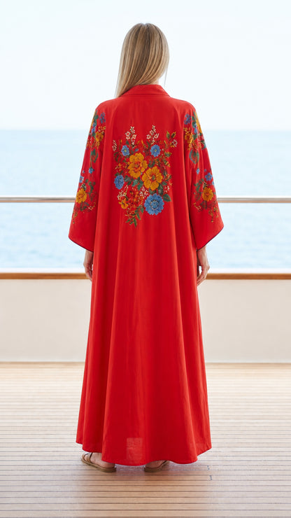Back view of red kaftan showing floral back embroidery