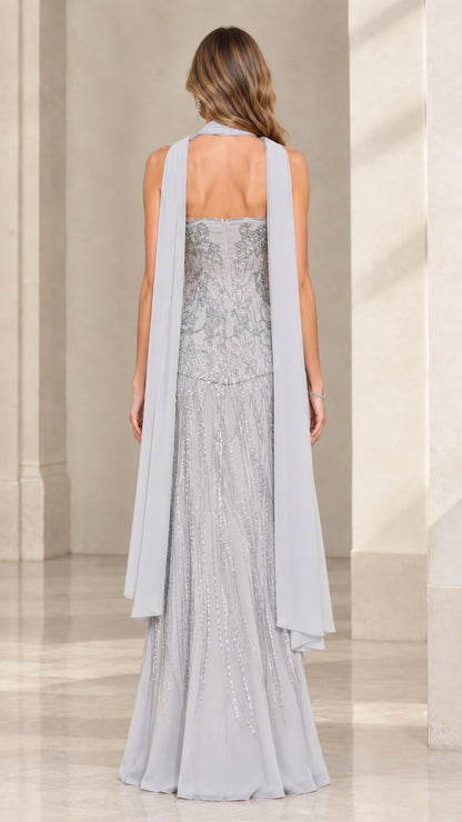 Back view of Silver Grey beaded strapless gown with sheer scarf flowing down the back