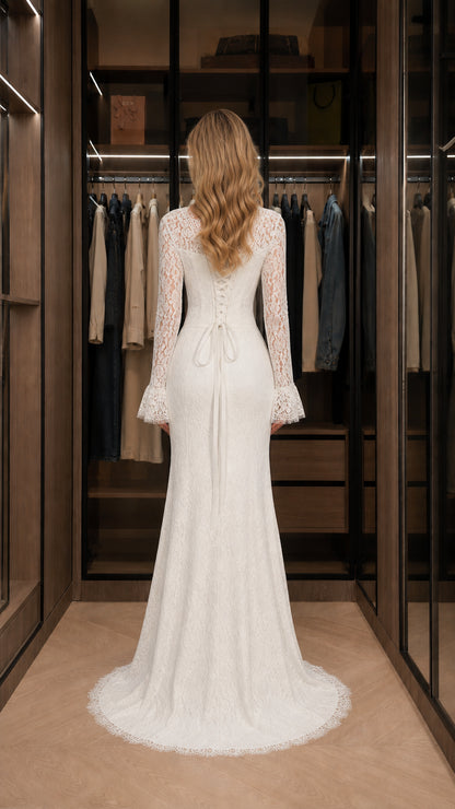 Back view of white lace maxi gown featuring adjustable corset lace-up back