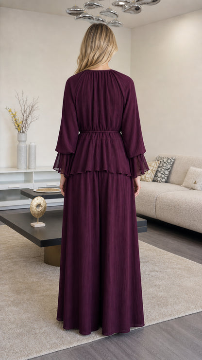 Back view of woman wearing Plum tiered peplum wide leg lounge set