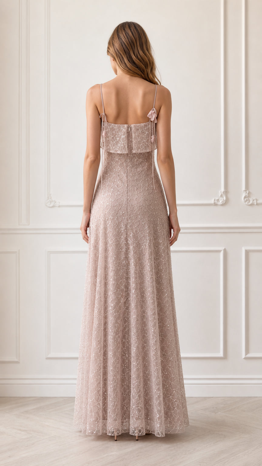Back view of model in dusty rose sequin spaghetti strap formal dress