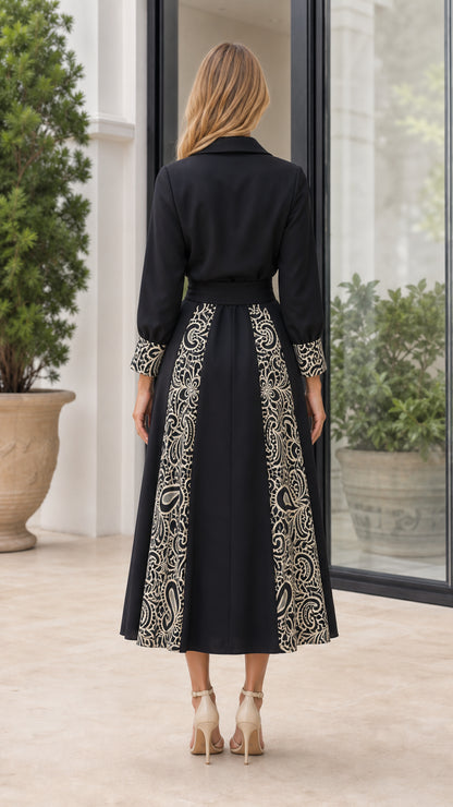 Back view of woman in Black embroidered midi shirt dress