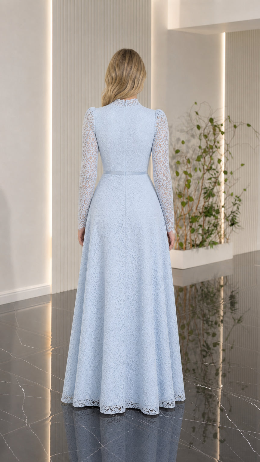 Back view of woman in light blue long sleeve lace maxi dress