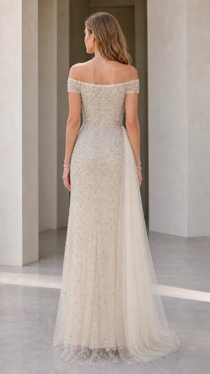 Back view showcasing tulle overskirt drape
