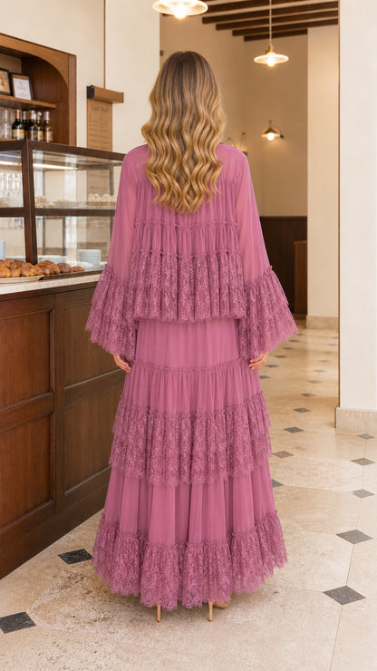 Back view of model wearing mauve tiered lace maxi dress
