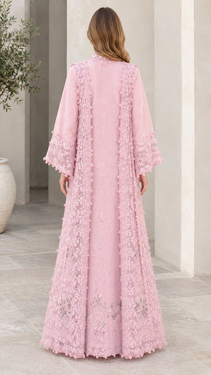 Back view of blush pink lace maxi dress featuring flared bell sleeves and flowing skirt